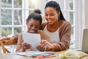 caregiver and child doing an activity together