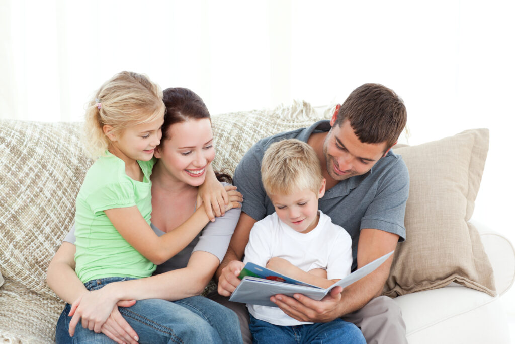 family reading a book